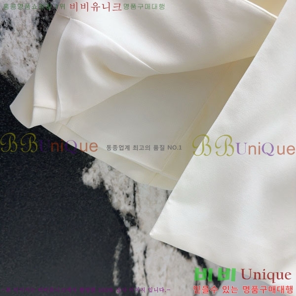   ǽ DO1560733-9